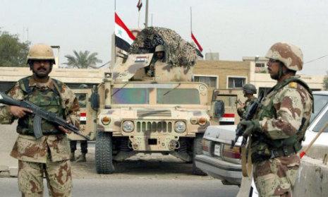 قوات الاحتلال الاميركية تسلم قاعدة بلد الى العراقيين
   

