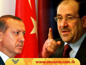Turkish PM Recep Tayyeb Erdogan (L), Iraqi PM Nouri al-Maliki (R)