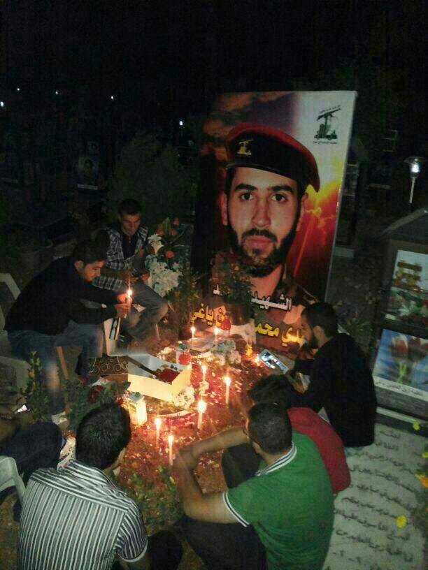 Martyr Mahdi Yaghi's friends at his grave