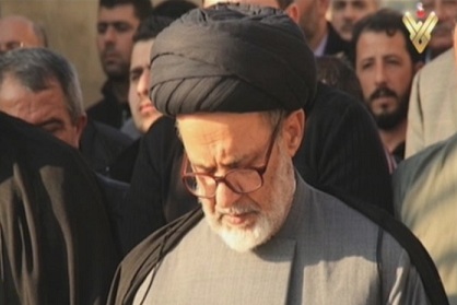 Body of Imam Al-Hasani Martyred in Hajj Stampede Returns Home