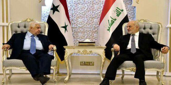 Moallem: Iraq & Syria Confront Same Aggression, Challenges
