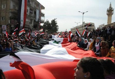 Une manifestation pro Assad à Damas, dimanche
