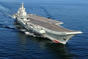 China envía un portaaviones, aviones y tropas a Siria