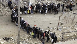 Militantes de localidades de Damasco negocian rendición al Ejército sirio