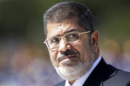 محاكمة ابن مرسي بتهمة تعاطي المخدرات
   

   
