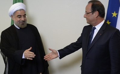 روحاني لهولاند: الأسد سوف يترشح في العام 2014