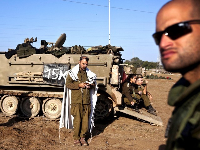 عين 