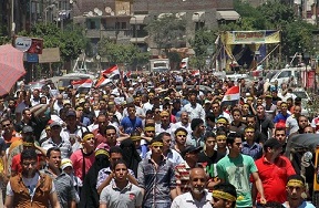مقتل 4 مسلحين انفجرت فيهم عبوتهم ومقتل فتى خلال تظاهرة في العاصمة المصرية