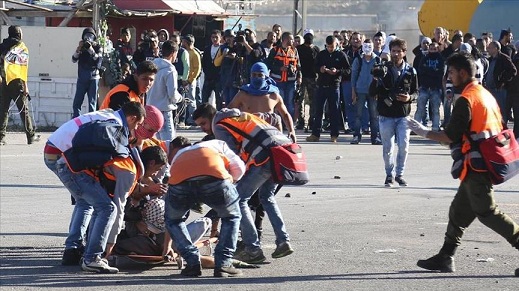 إصابة 14 فلسطينيا في مواجهات مع جيش الاحتلال الاسرائيلي في الضفة الغربية