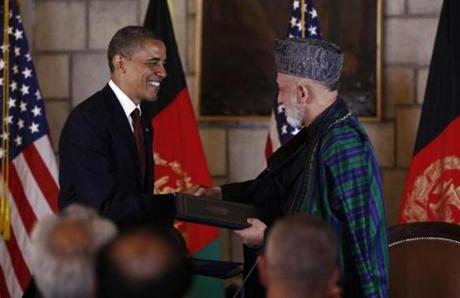 Obama, Karzai Sign Strategic Pact as Blasts Shake Kabul