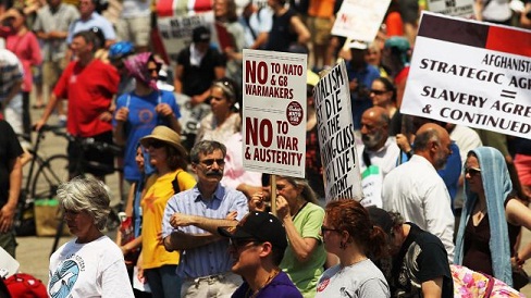 Anti-NATO Protests in Chicago Rap US Spending on Wars   
