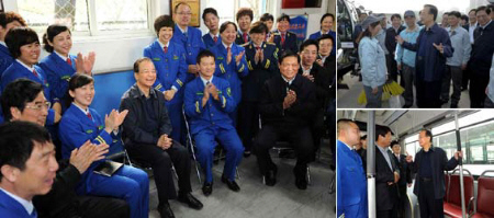 Chinese Chinese Premier Wen Jiabao visits environmental sanitary workers and bus drivers in Beijing, capital of China, May 1, 2012, on International Labour Day. (Xinhua)