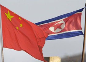China, NKorea flags