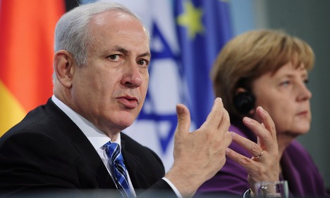 Zionist Prime Minister Benjamin Netanyahu (L), German Chancellor Angela Merkel (R) 