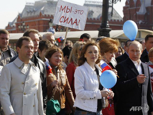 Putin, Medvedev Join Soviet-Style Labor Day March