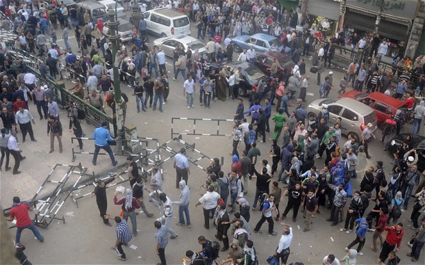 Clashes in Tahrir Square as Egypt Sinks Deeper into Crisis