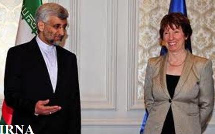 Iran top nuclear negotiator Saeed Jalili (left), EU foreign policy chief Catherine Ashton (right)