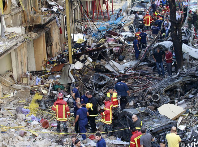 Lebanon: rubble fills the street after Friday's bombing in Beirut; Oct. 19, 2012