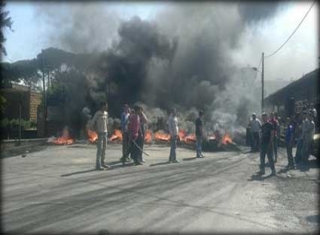 Al-Mustaqbal and March 14 partisans cut the Lebanese roads with burning tires; Oct 21, 2012