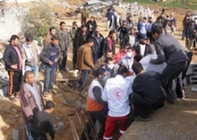 Removal of bodies from the house of Wa'el a-Samuni, in Gaza City. Photo: B'Tselem; Jan 18, 2009.