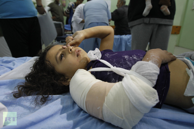 Palestinian child lies injured on a hospital bed following an Israeli air raid in Beit Lahia, the northern Gaza Strip; Nov. 17, 2012 (AFP)