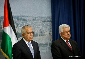 Reshuffled Palestinian Gov’t Sworn in, Fatah Backs, Hamas Slams