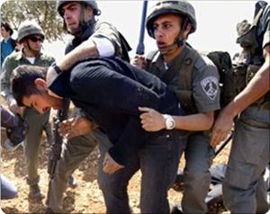 Zionist soldiers arrest Palestinians and beat them