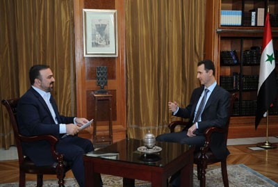 Assad: Arab and Western Countries Provide Armed Opposition with Weapons