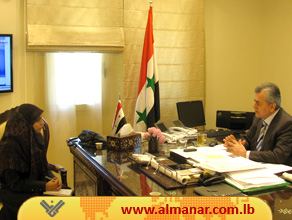 Syrian Ambassador to Lebanon Ali Abdulkarim Ali speaking to the journalist Somaya Ali