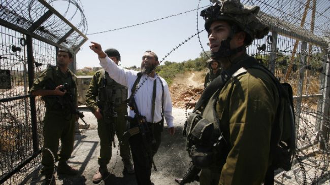 Armed Jewish settlers and Zionist soldiers