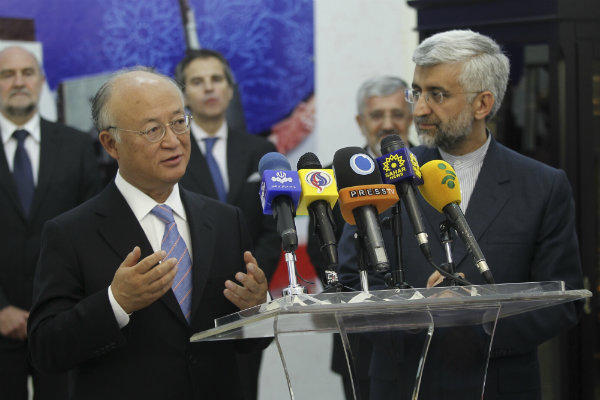 IAEA Director General Yukiya Amano (left) and secretary of Iran’s Supreme National Security Council Saeed Jalili (right) during a joint press conference in Tehran Monday; May 21, 2012