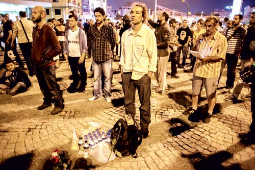 Protests in Turkey Go “Silent” after Police Storm, Seal off Taksim Square