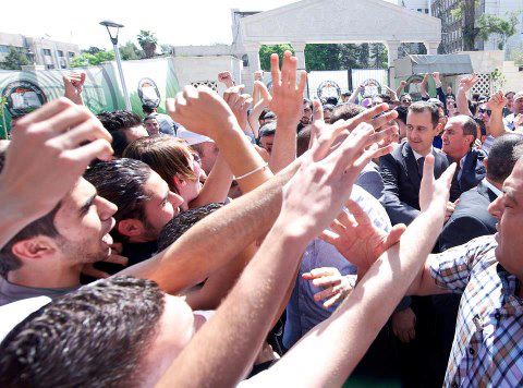 Assad Joins Crowds for Unveiling Monument at Damascus University