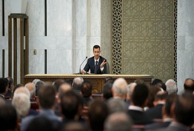 Assad during Baath meeting on Monday