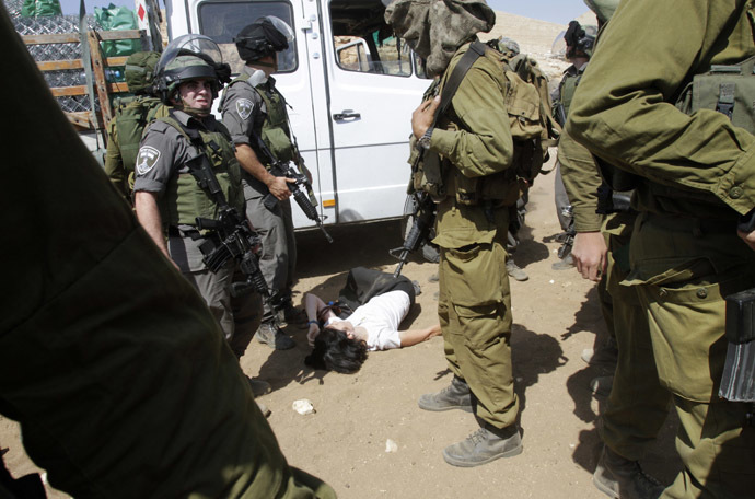 Israeli Soldiers Assaulting Palestinians