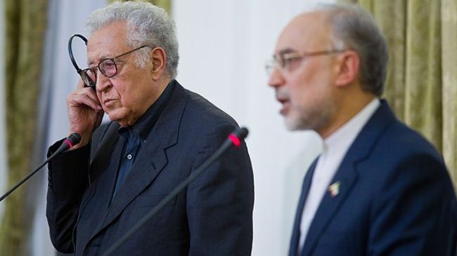 Brahimi, Salehi Urge Political Solution to Syria Crisis
