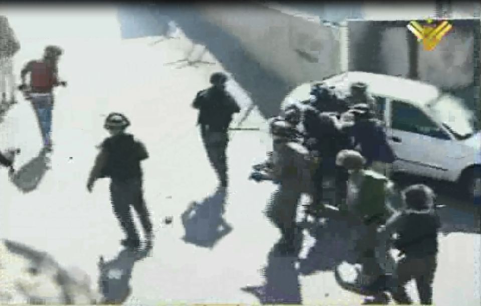 Israeli Soldiers Assault Palestinians