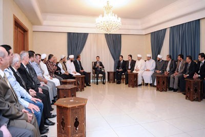 President Assad as he received dignitaries from Damascus