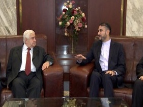 Abdollahian Receives Moallem, Assures Iran’s Support to Syria