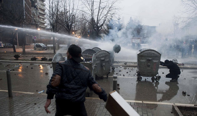 Kosovo Police Use Tear Gas to Disperse Thousands of Protesters in Capital