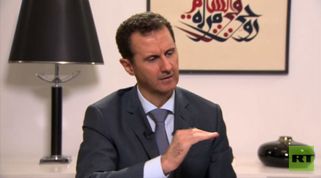 Assad: West Cries for Refugees with One Eye, Aims Gun with the Other