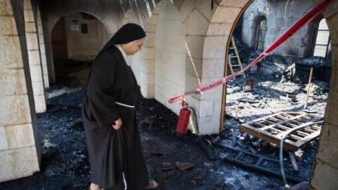 Israeli Police Detain 16 Settler Youths over Fire at `Miracle` Church
