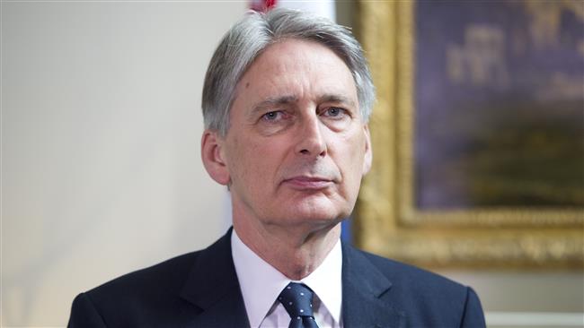 Hammond Arrives in Tehran, Reopens UK Embassy