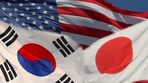 flags of US, Japan and South Korea