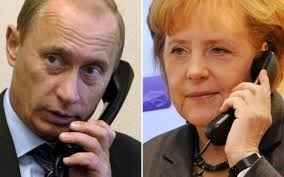 Merkel Tells Putin to ’Use Influence’ to Rein in Ukraine Separatists