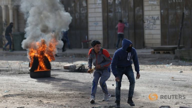 Palestinian Throws Petrol Bomb at Soldiers, Shot Dead
