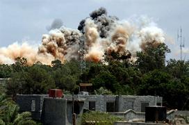 NATO Proceeds Strikes on Tripoli, Russia Recants on Gaddafi
