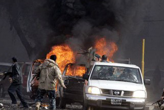 Twin Bombings Kill 12, Injure 28 in Iraq