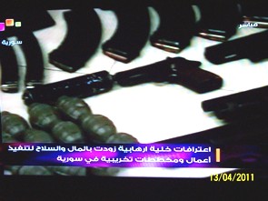 Muallem Holds Meetings in NY as Arms Seized in Homs