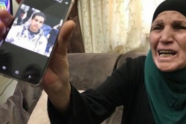 والدة الشهيد اياد الحلاق